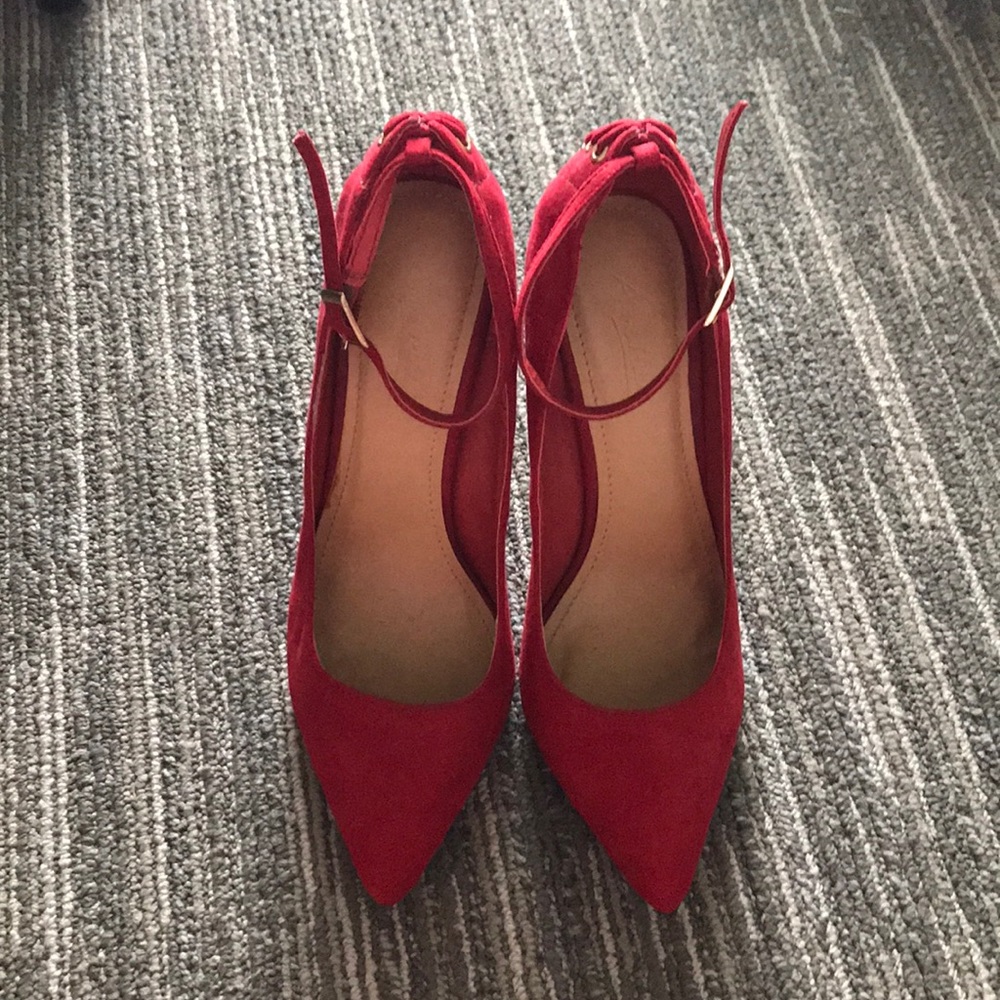 Red high heels. It’s probably 4.5 or 5 inches.